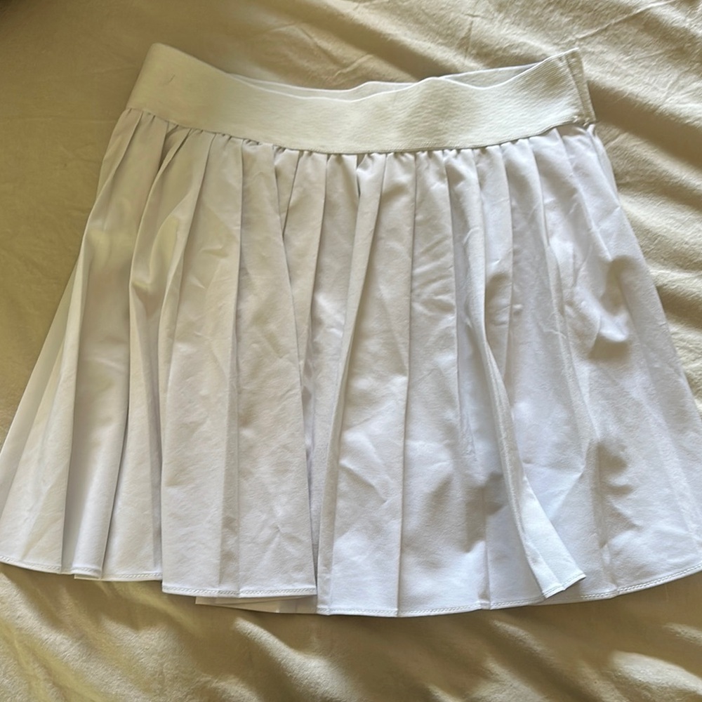 Elegant White Pleated Skirt by Garage